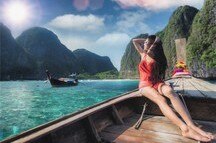 Unwind with a relaxing boat ride around Phi Phi Island Unwind with a relaxing boat ride around Phi Phi Island